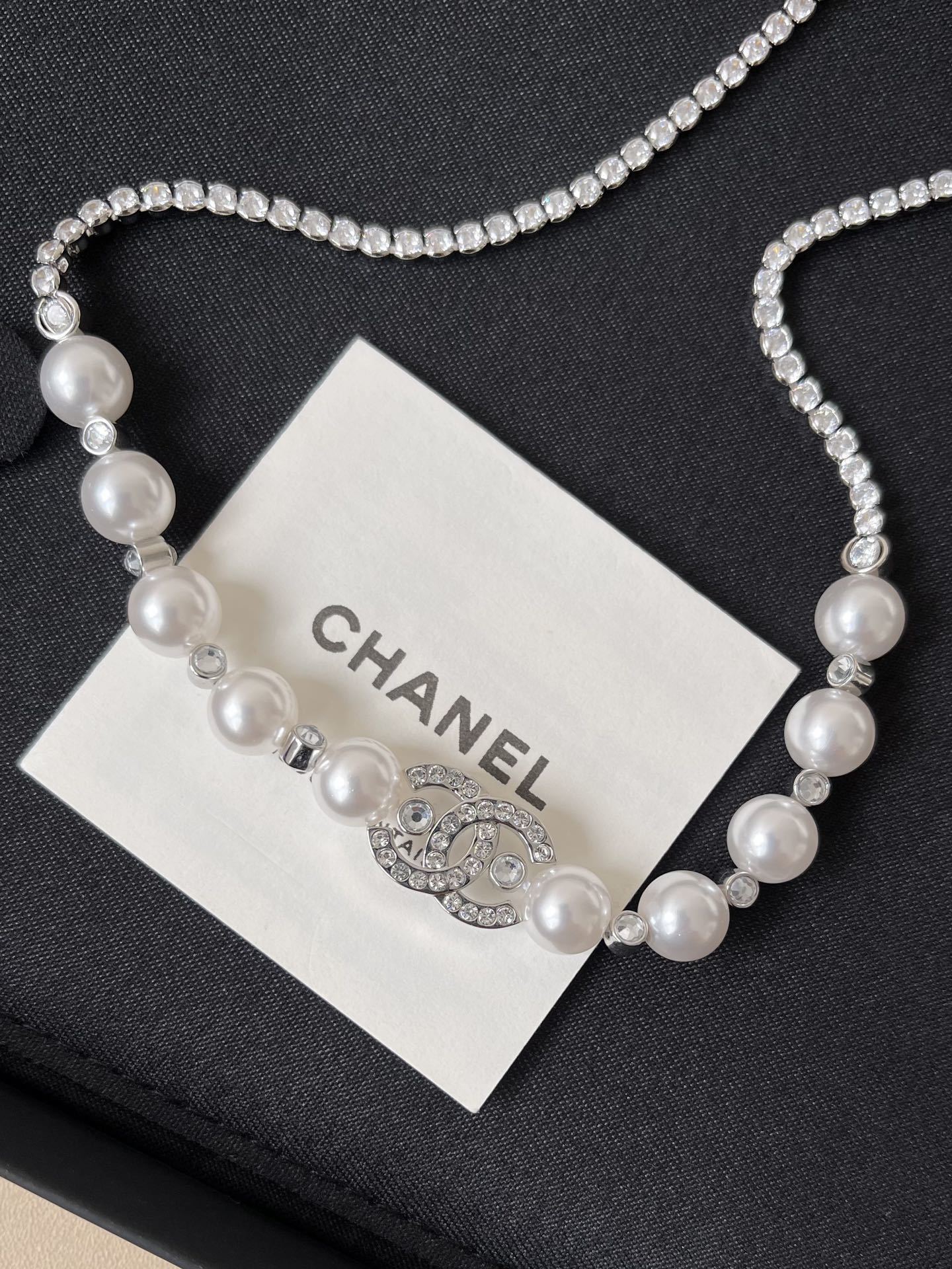 Elegant Silver Pearl Necklace with Sparkling Crystal CC Logo Pendant