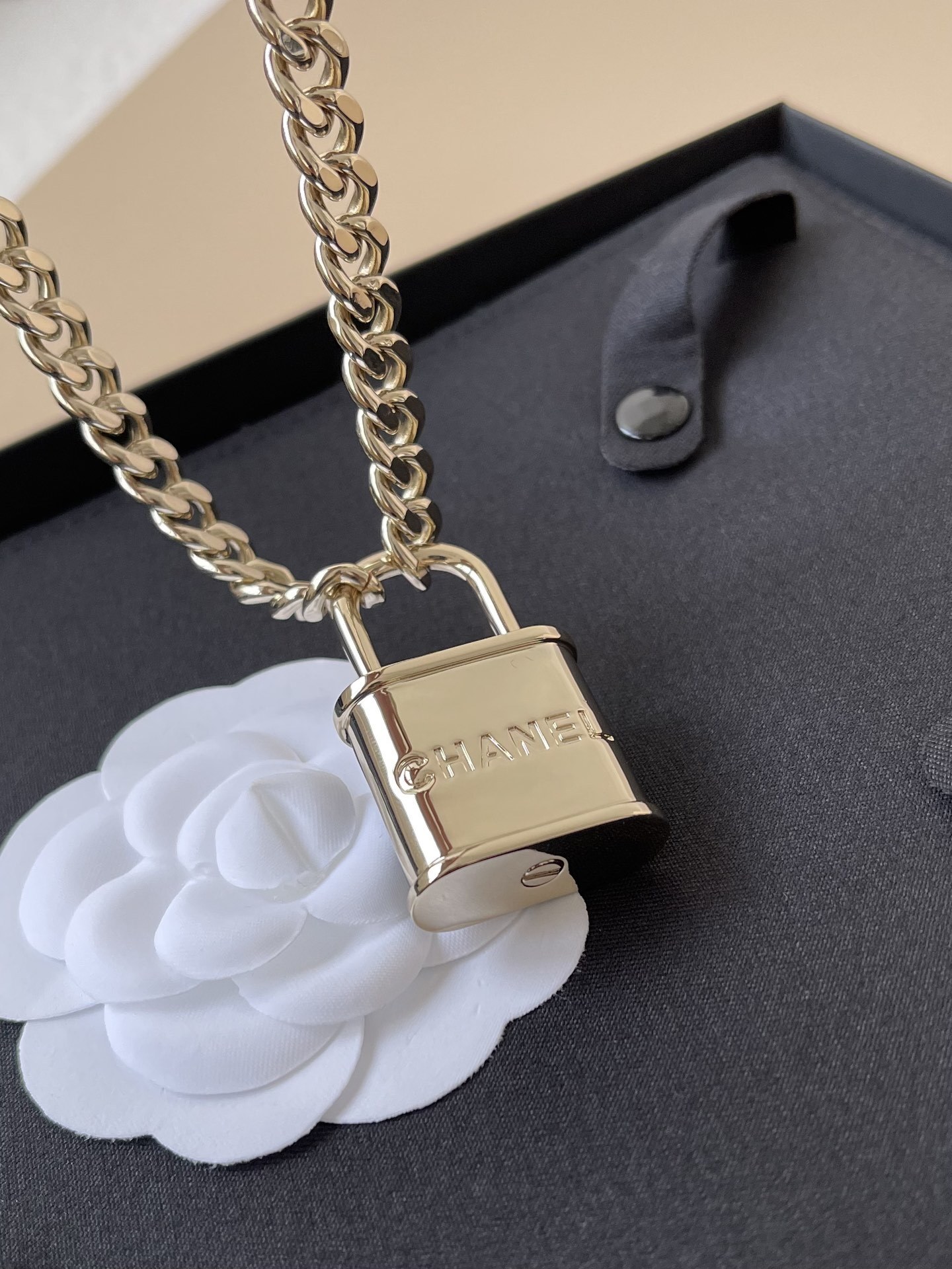 Chanel CC Padlock Necklace - Gold Chain & Black Leather Pendant