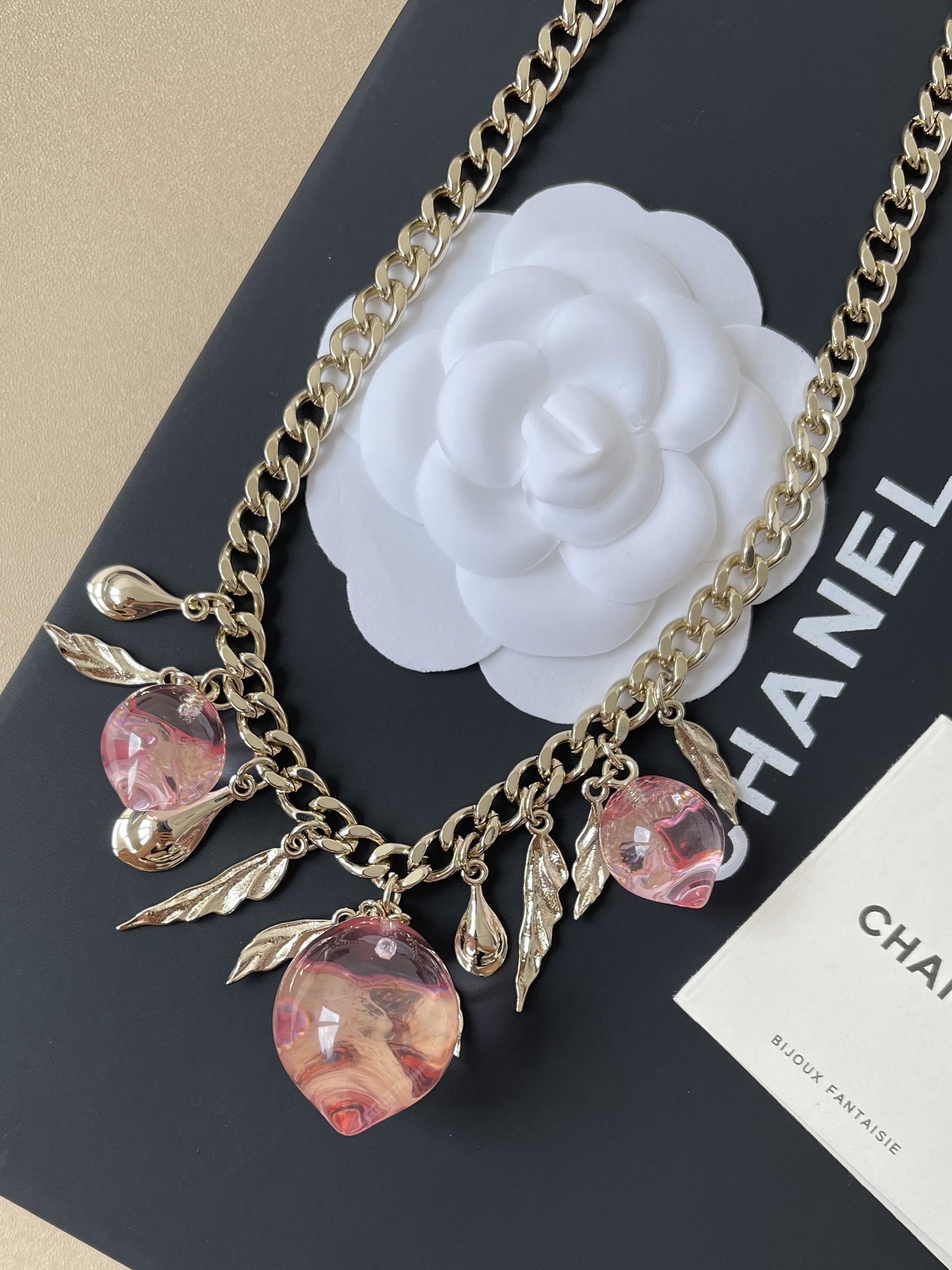Chanel 2024/25 Métiers d'art Pink Resin & Gold Charm Necklace