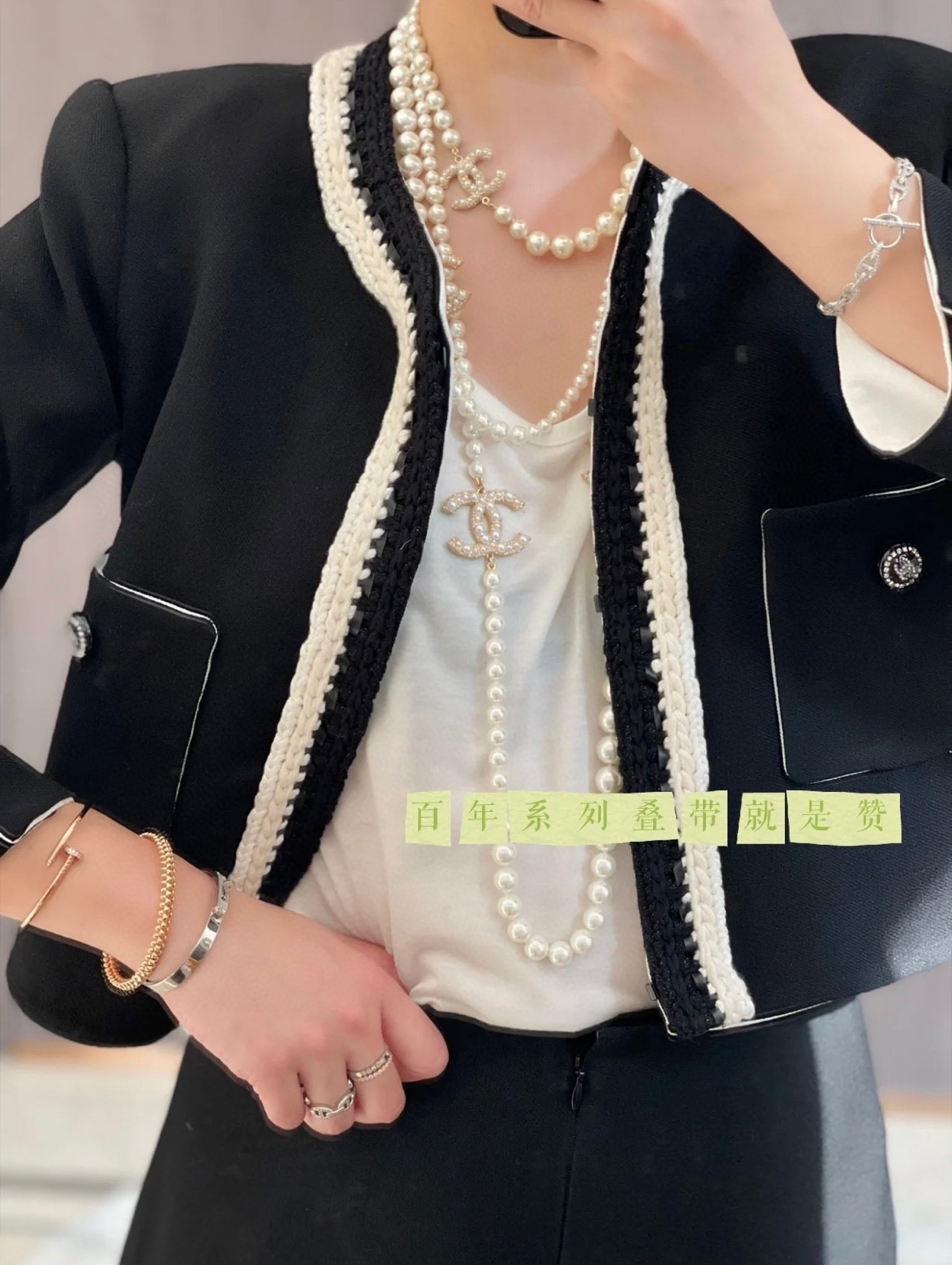 Chanel Elegant Long Pearl Necklace with Embellished CC Logos