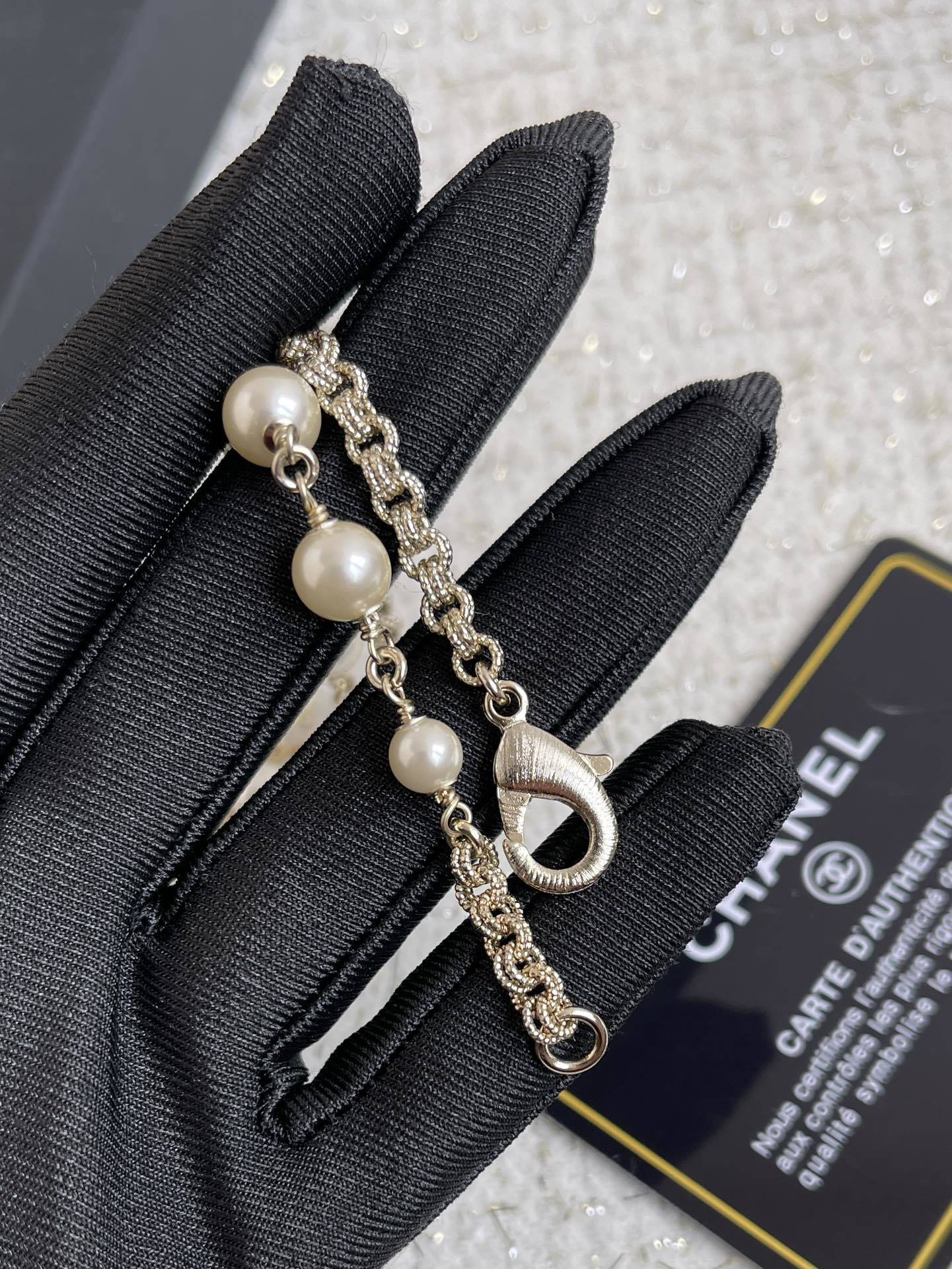 Luxury Long Pearl Necklace with Crystal CC Logo Accents - Elegant