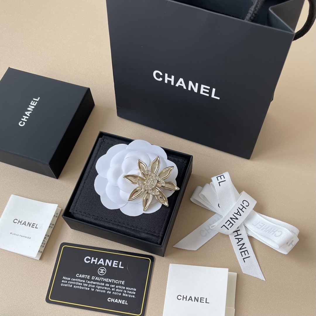 Chanel Crystal Flower Brooch - Luxury Gold Sunburst CC Pin