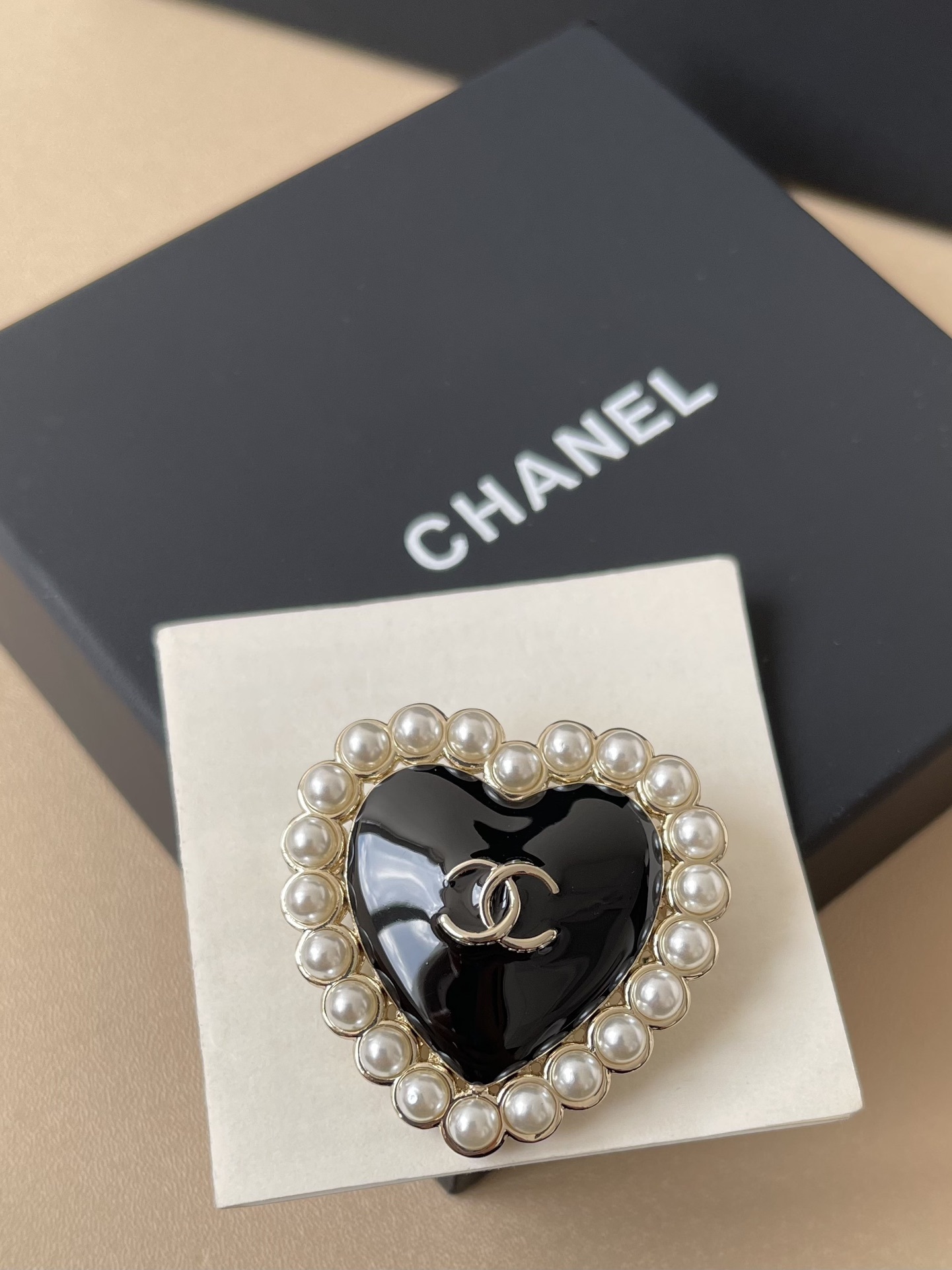 Luxury CC Heart Brooch with Black Enamel and Pearl Border