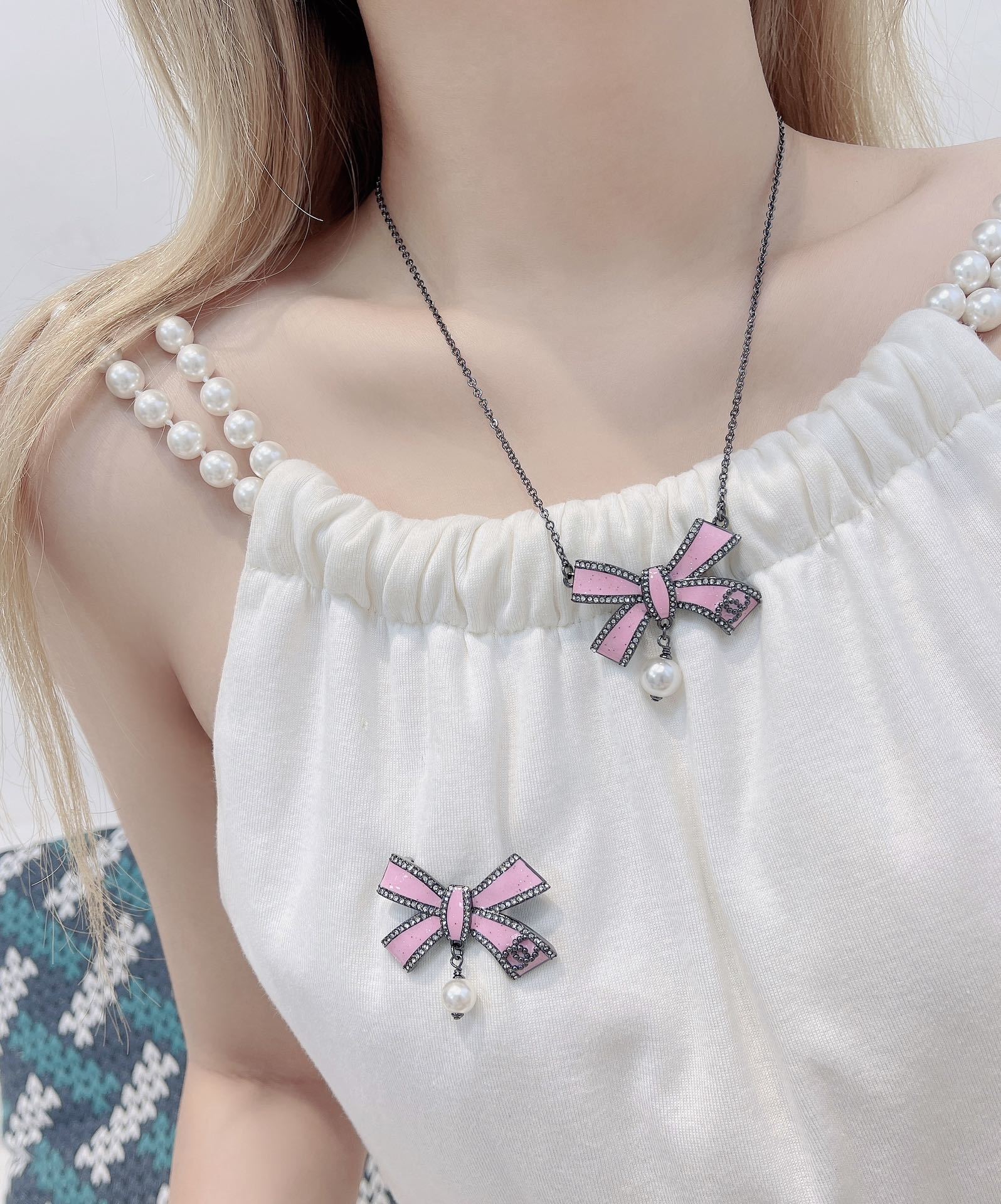 Luxury Chanel Pink Bow Brooch with Pearl Drop & Crystal Accents