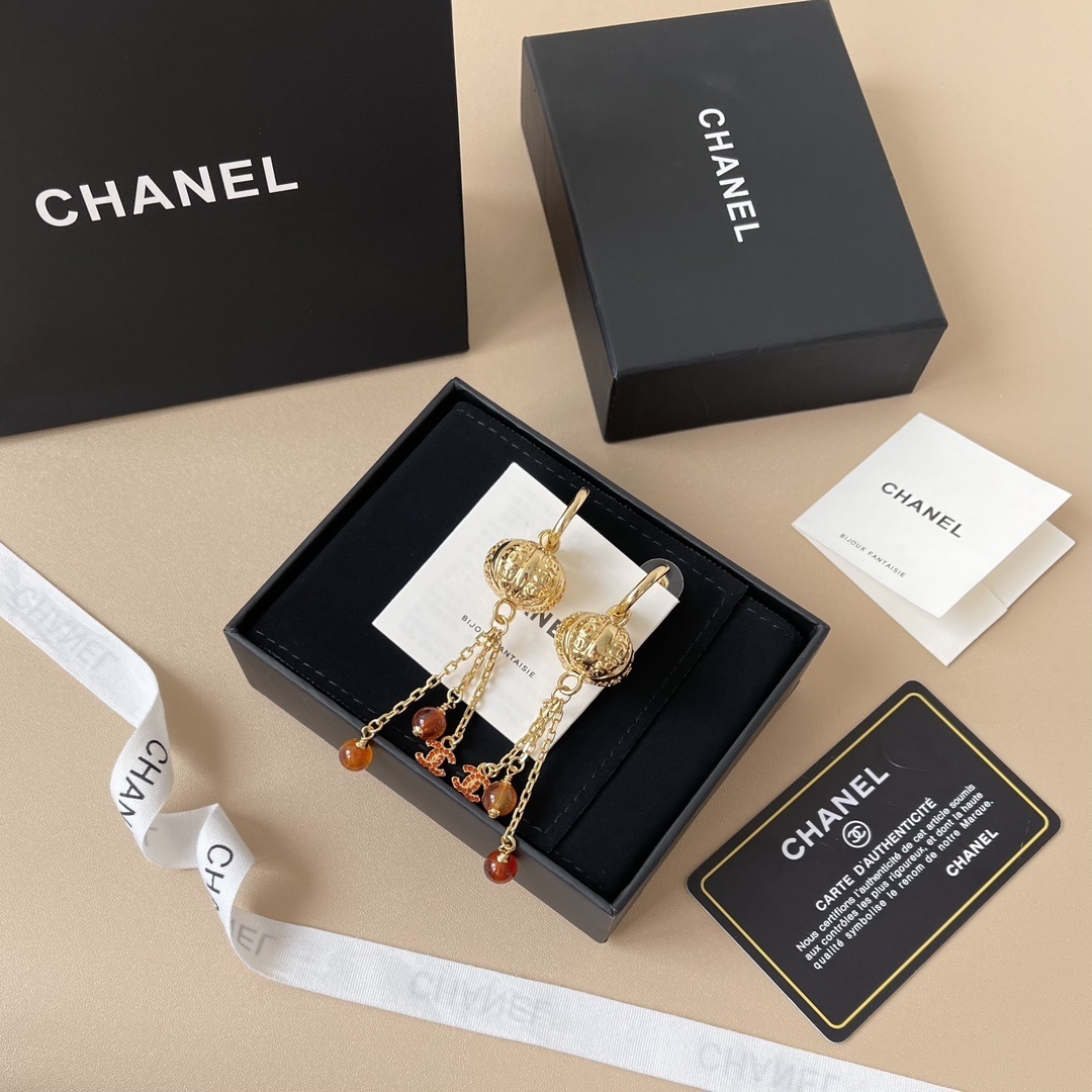 Chanel Vintage Gold Dangle Earrings with Red Beads & CC Logo