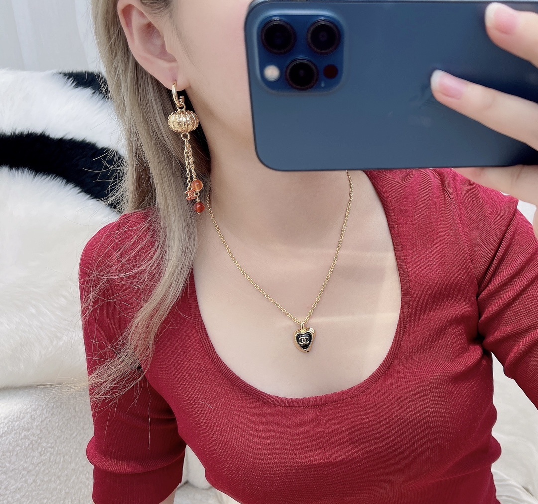 Chanel Vintage Gold Dangle Earrings with Red Beads & CC Logo