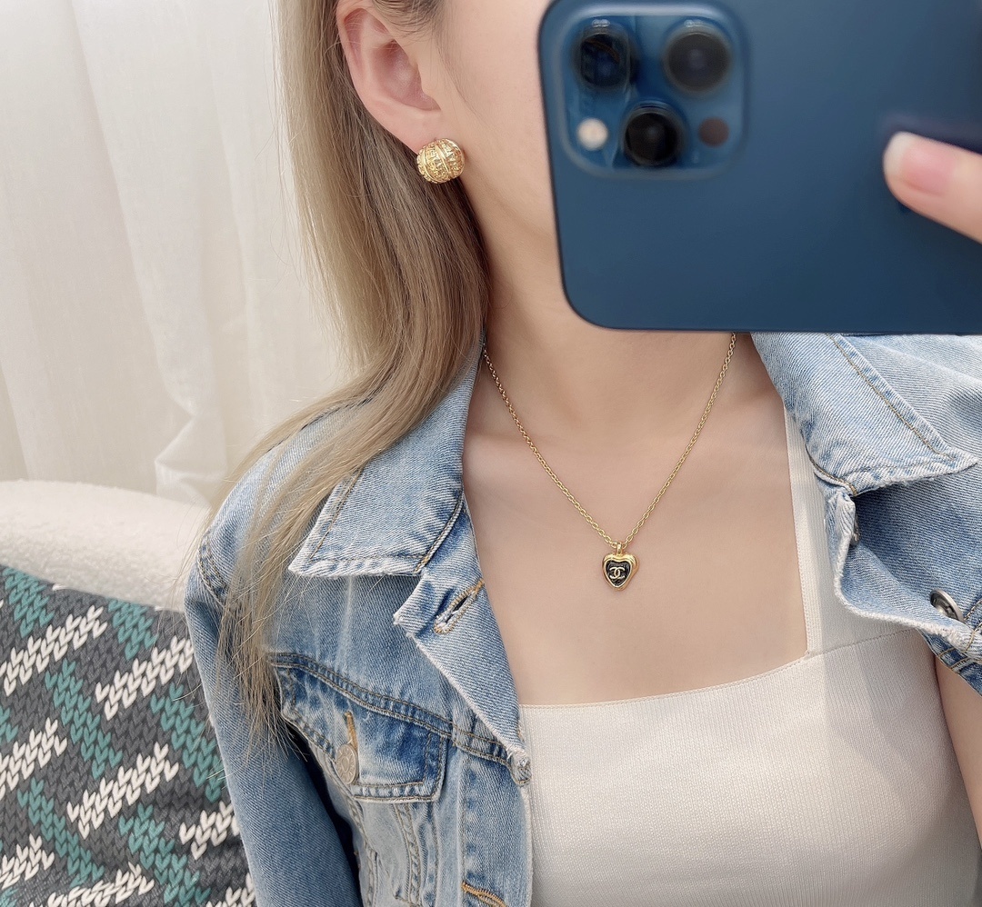 Chanel 2024/25 Métiers d'art Gold-Tone Metal Button Stud Earrings