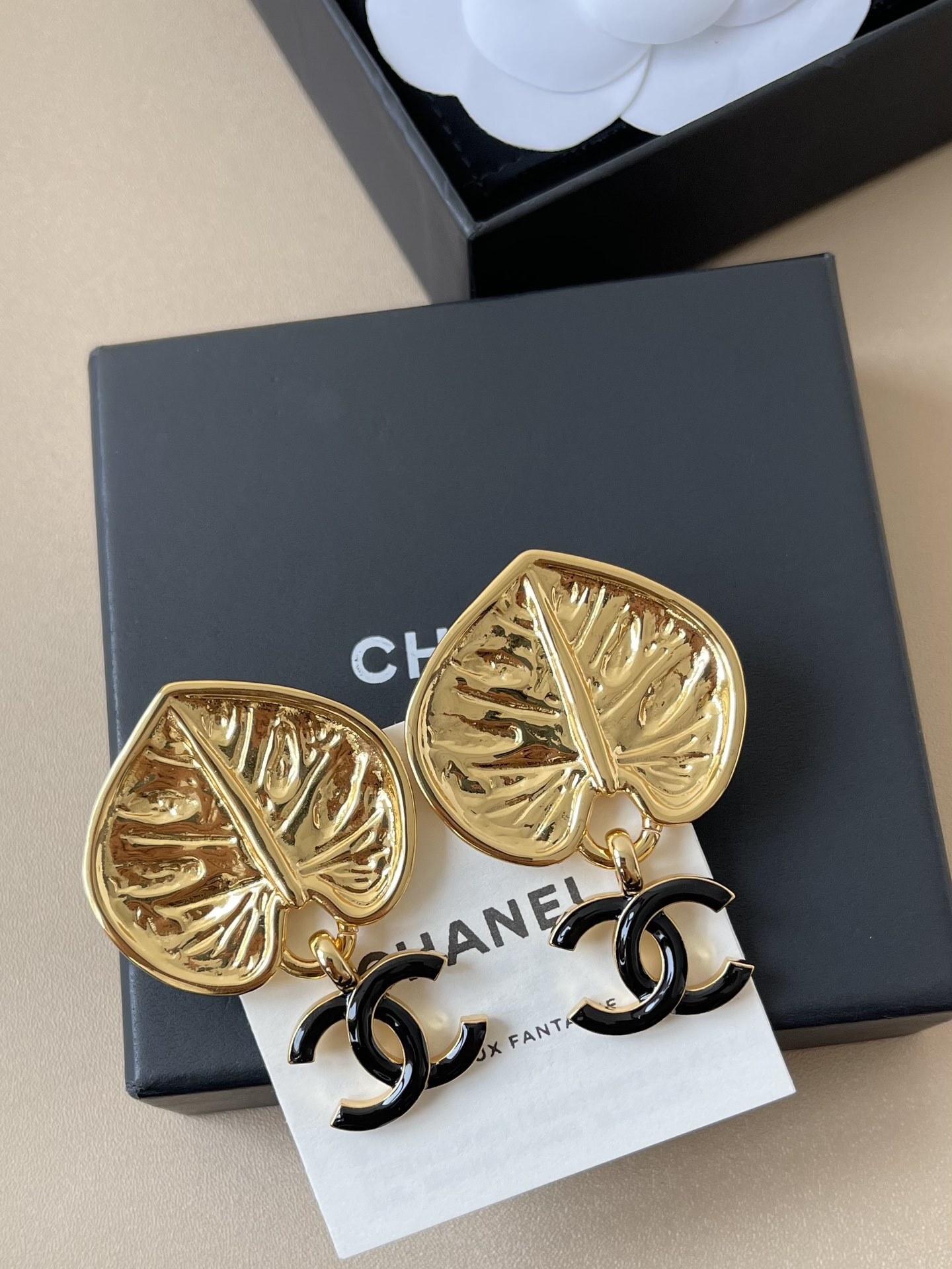 Chanel 2024/25 Métiers d'art Gold Leaf & Black CC Logo Earrings