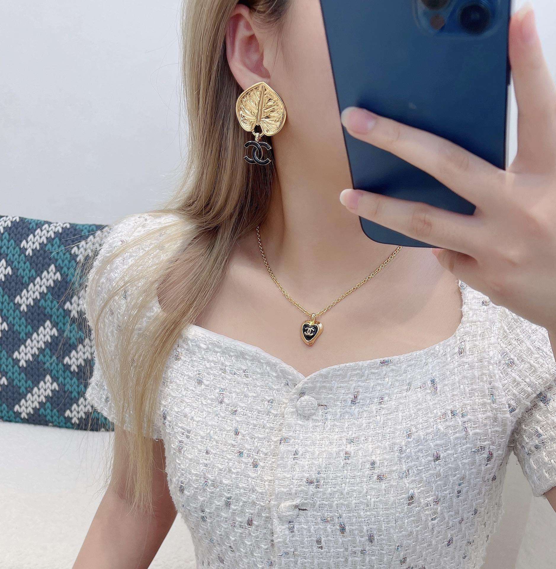 Chanel 2024/25 Métiers d'art Gold Leaf & Black CC Logo Earrings