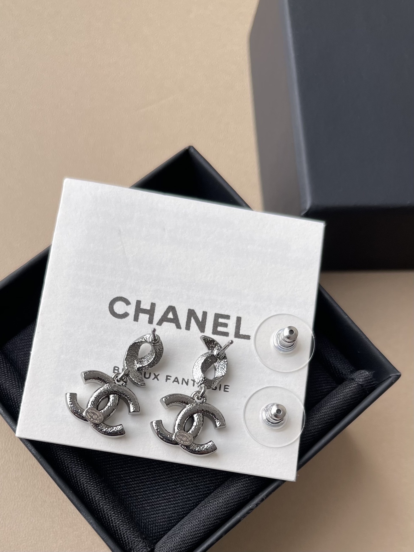 Luxury Chanel CC Crystal Ribbon Earrings - Elegant Silver Jewelry