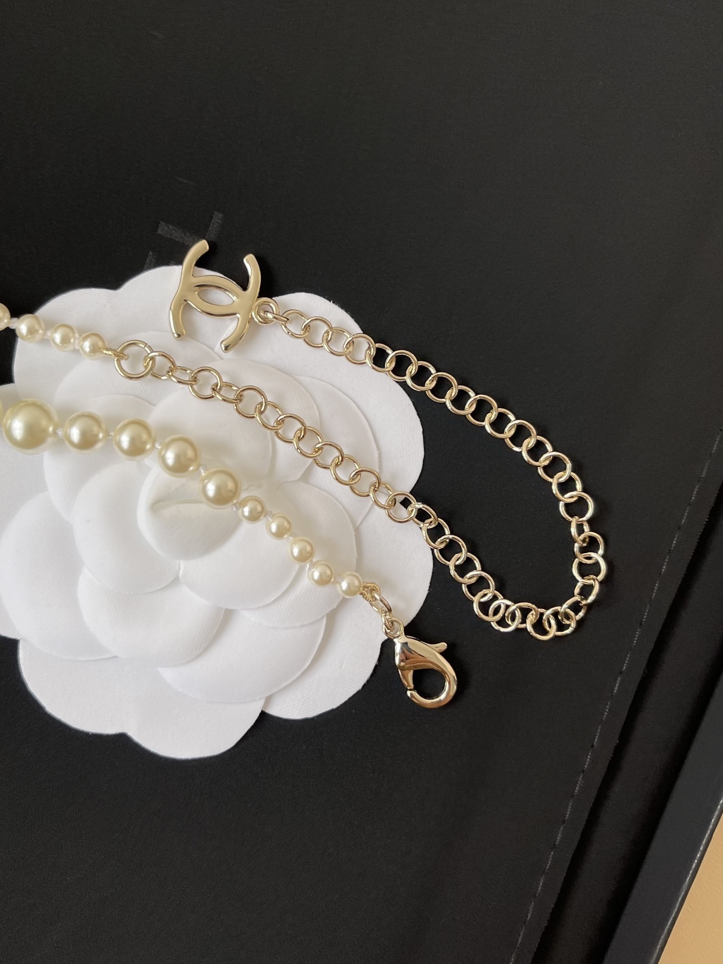 Chanel 2025 Pearl Chain Belt with CC Logo and Rhinestone Charms