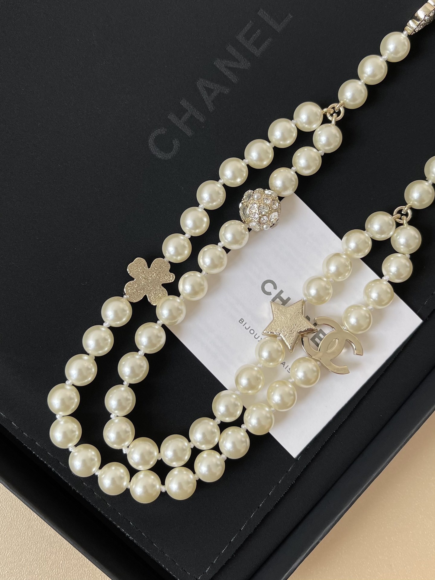 Chanel 2025 Pearl Chain Belt with CC Logo and Rhinestone Charms
