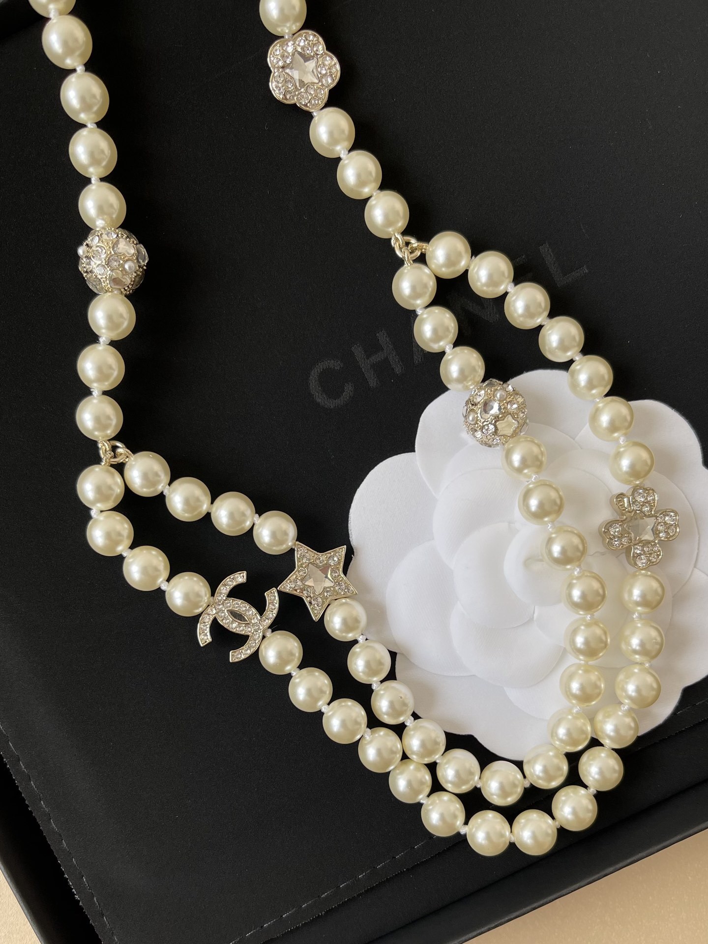 Chanel 2025 Pearl Chain Belt with CC Logo and Rhinestone Charms