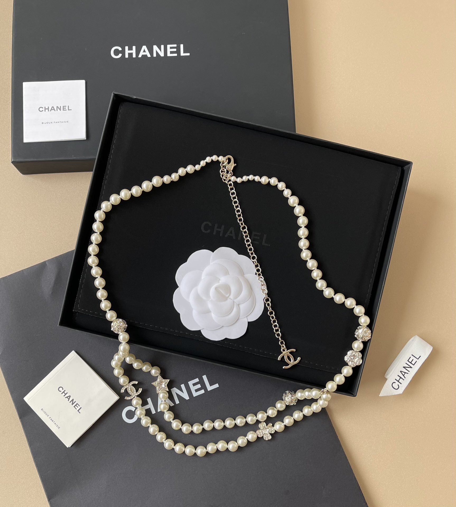 Chanel 2025 Pearl Chain Belt with CC Logo and Rhinestone Charms
