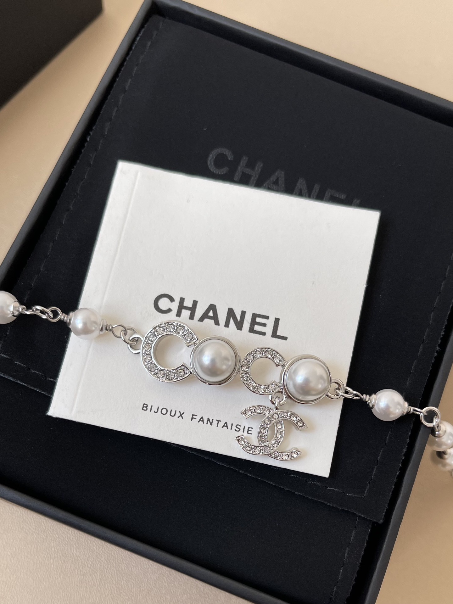 Chanel CC Logo Pearl Bracelet - Silver Metal & Crystal - 2025 Edition