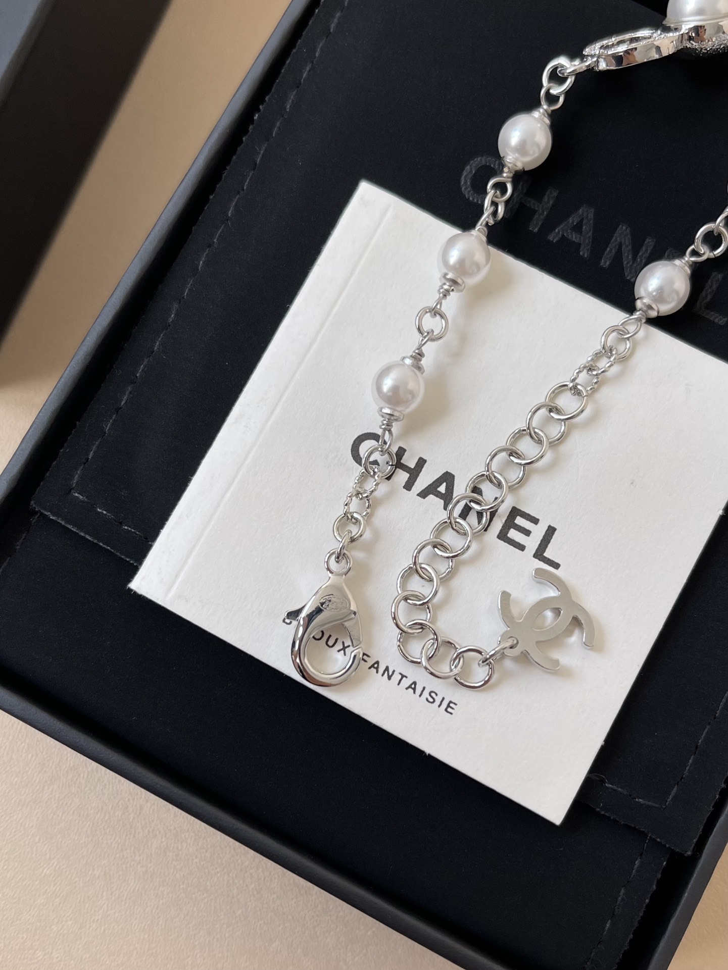 Chanel CC Logo Pearl Bracelet - Silver Metal & Crystal - 2025 Edition