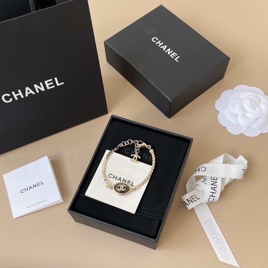 Chanel Gold CC Logo Bracelet with Black Glitter Oval Pendant