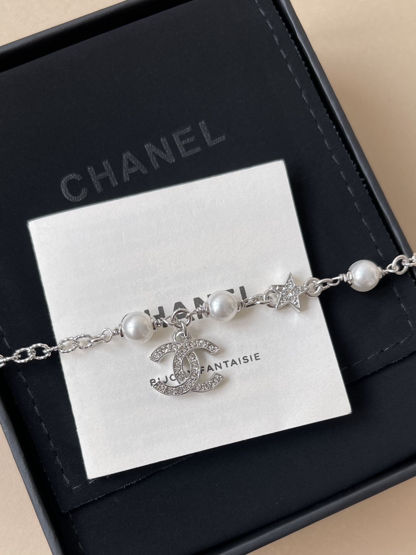 Elegant Silver CC Bracelet with Pearls and Crystal Star Charm