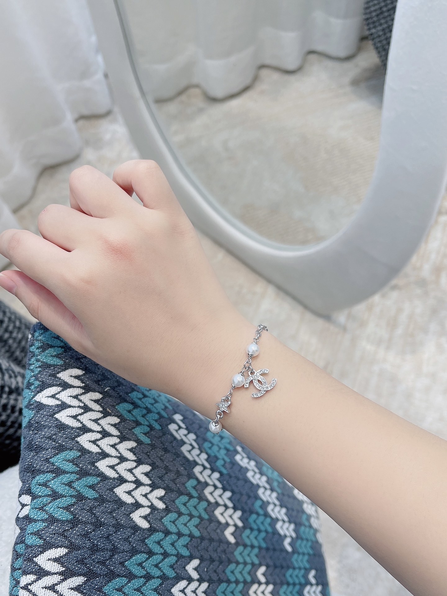 Elegant Silver CC Bracelet with Pearls and Crystal Star Charm
