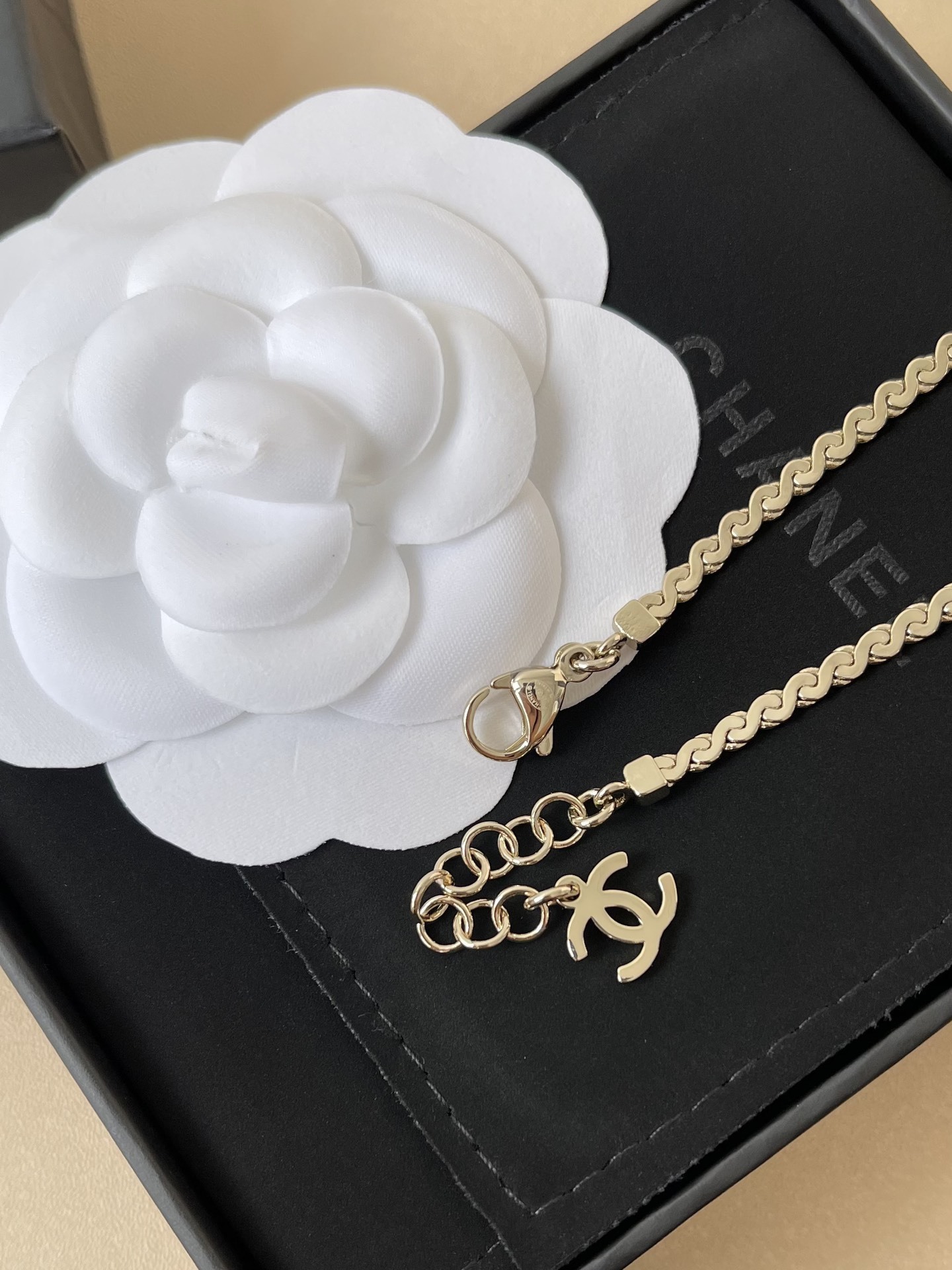 Chanel Gold-Tone Oval CC Logo Bracelet with Glitter Detail