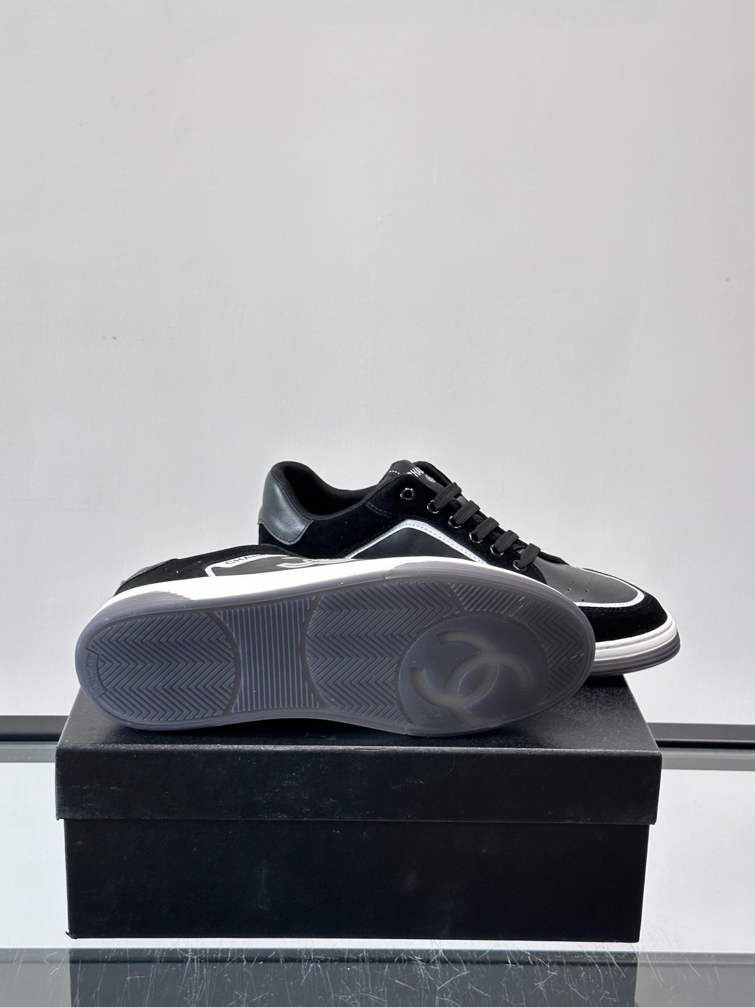 Chanel Luxury Black Leather & Suede Low-Top Sneakers with CC Logo