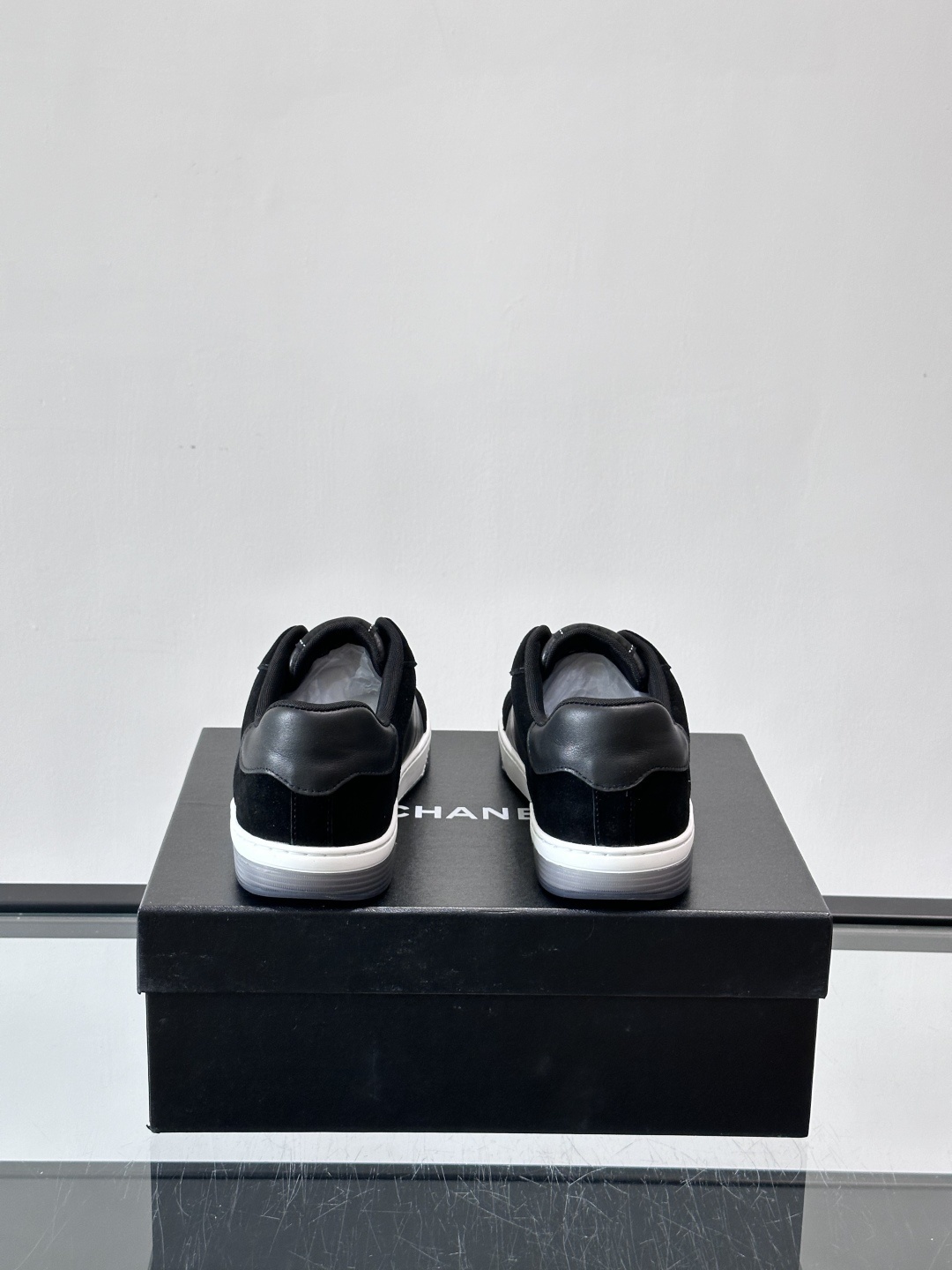 Chanel Luxury Black Leather & Suede Low-Top Sneakers with CC Logo