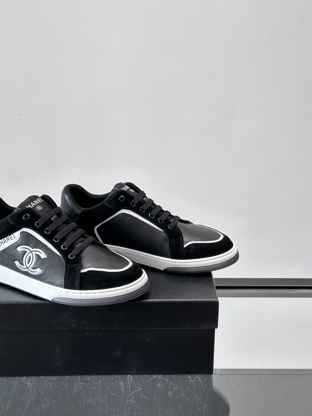 Chanel Luxury Black Leather & Suede Low-Top Sneakers with CC Logo