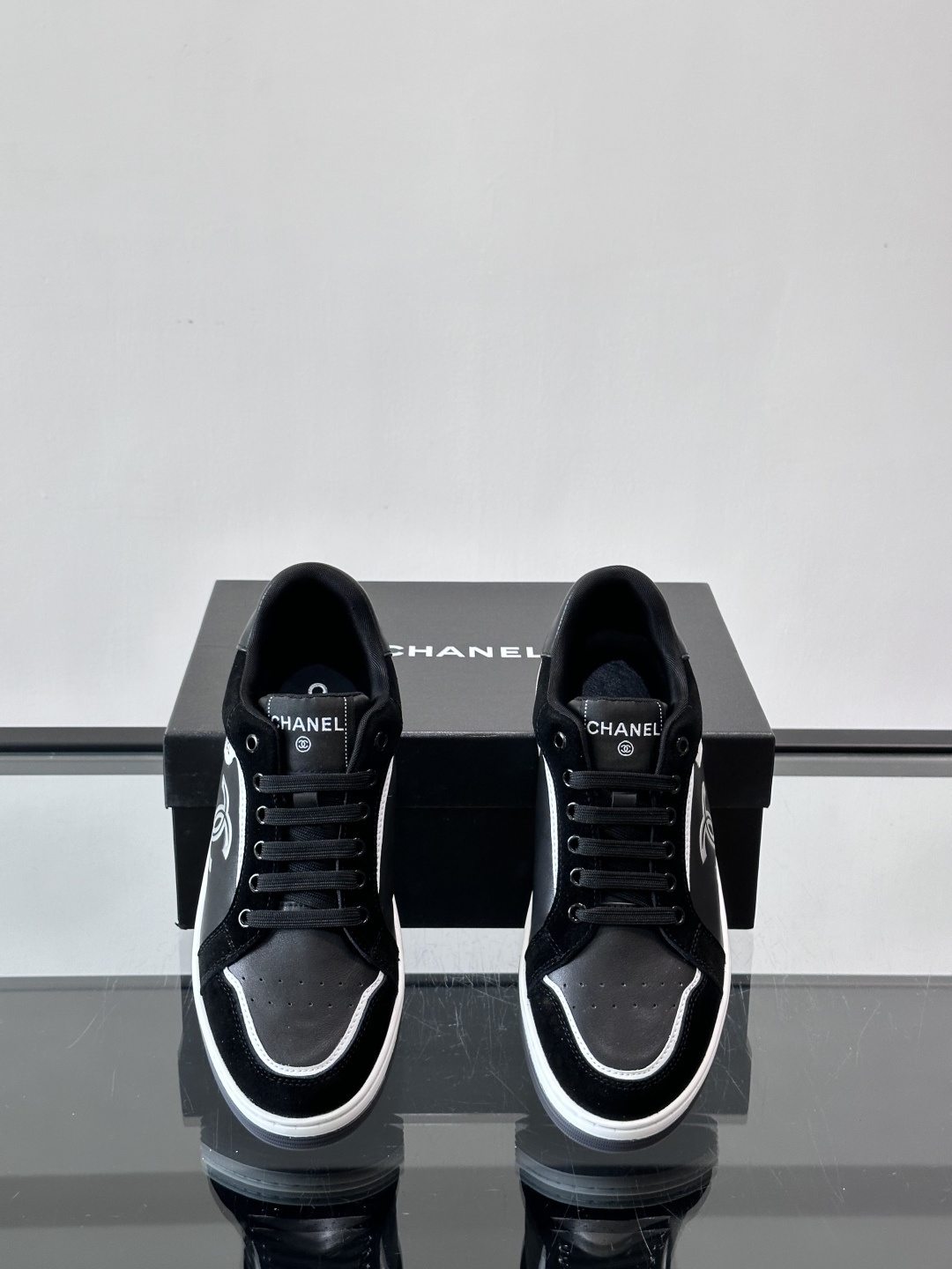 Chanel Luxury Black Leather & Suede Low-Top Sneakers with CC Logo