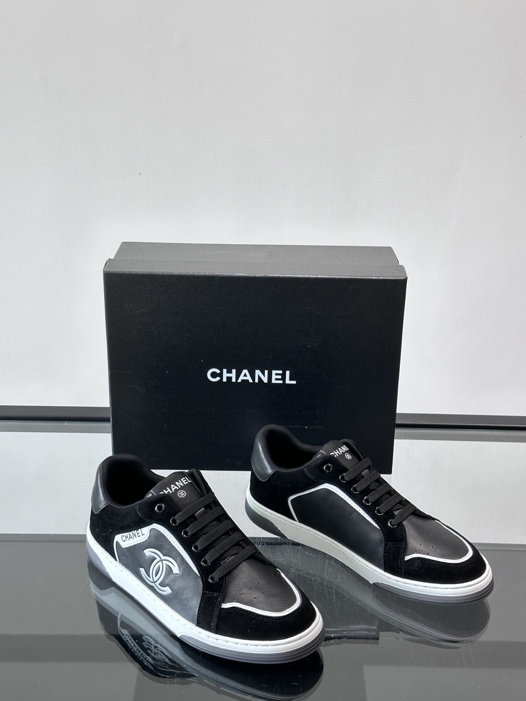 Chanel Luxury Black Leather & Suede Low-Top Sneakers with CC Logo