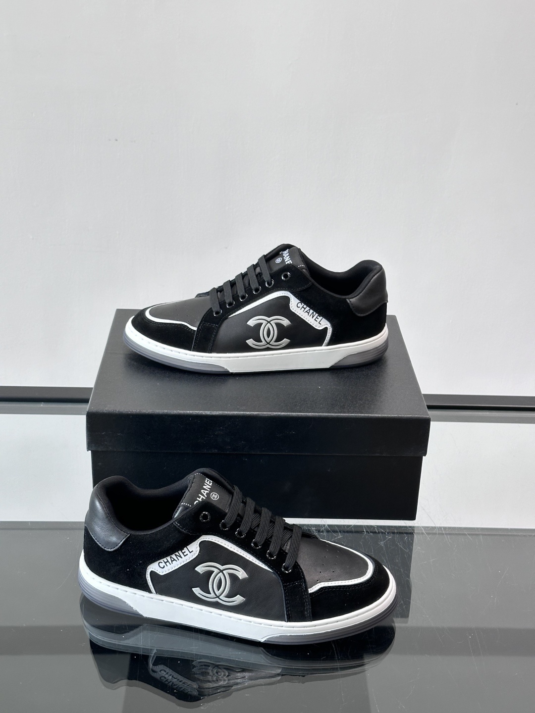 Chanel Luxury Black Leather & Suede Low-Top Sneakers with CC Logo