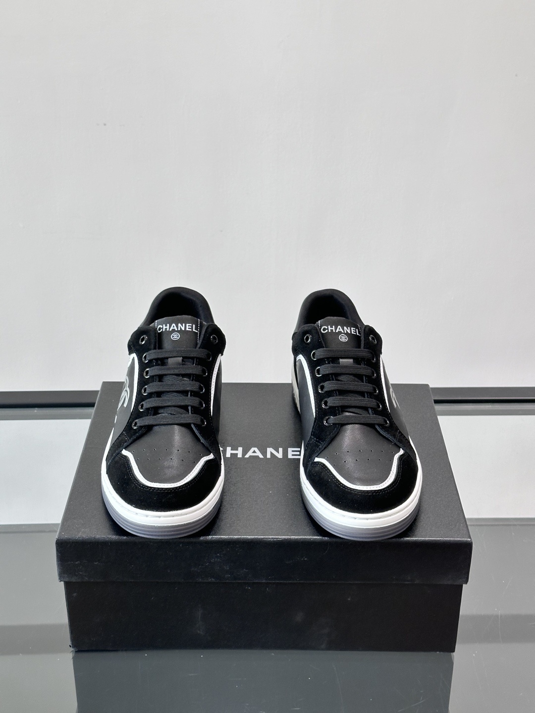 Chanel Luxury Black Leather & Suede Low-Top Sneakers with CC Logo