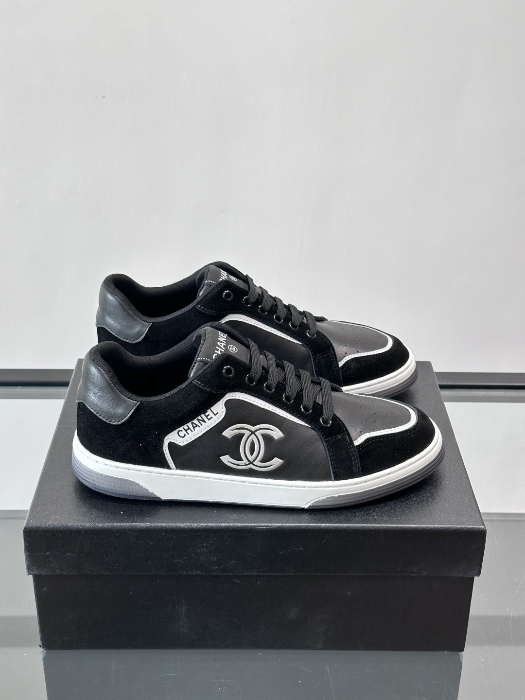 Chanel Luxury Black Leather & Suede Low-Top Sneakers with CC Logo