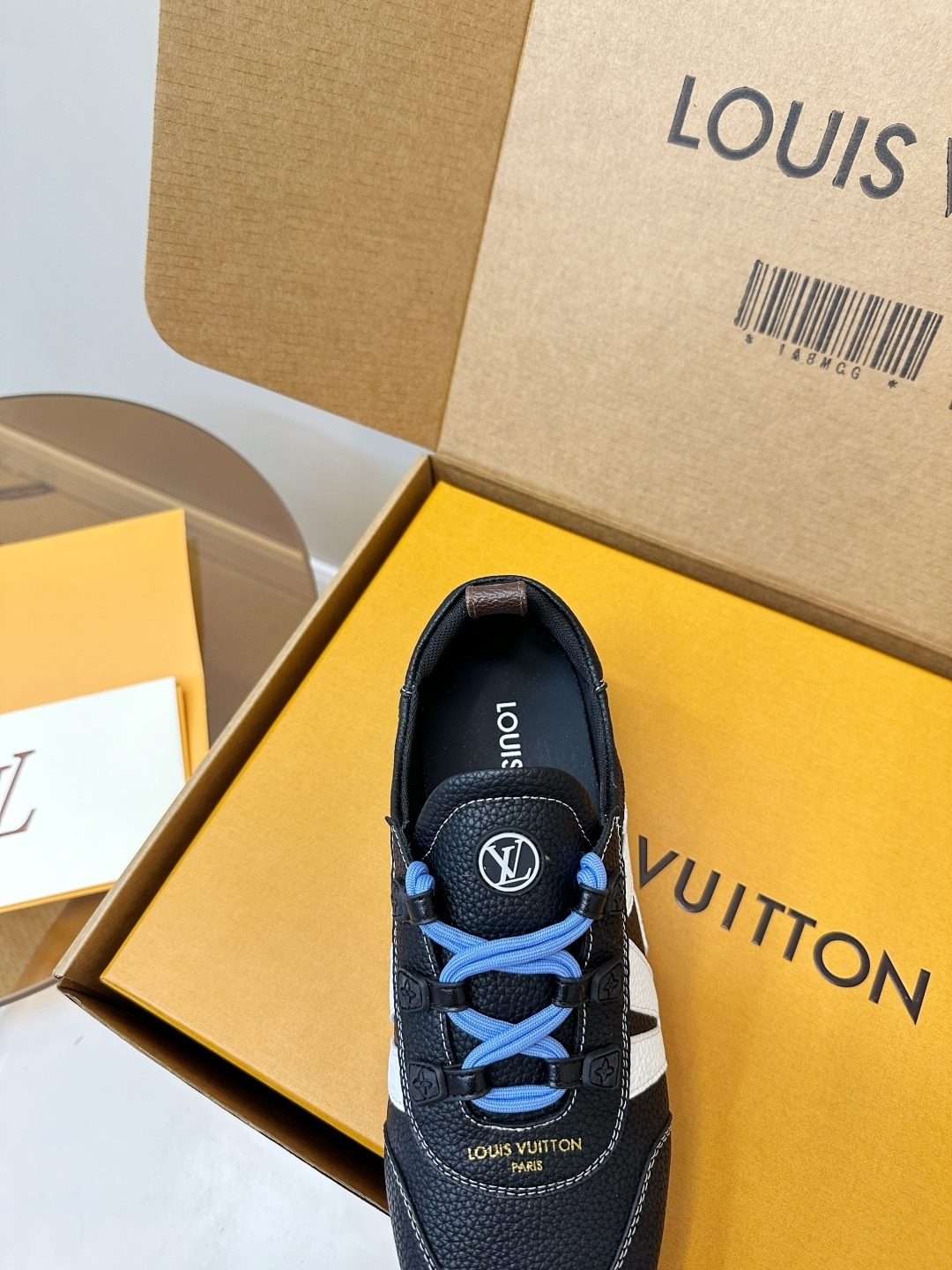 Louis Vuitton Men's Black Textured Leather Sneakers with Blue Laces