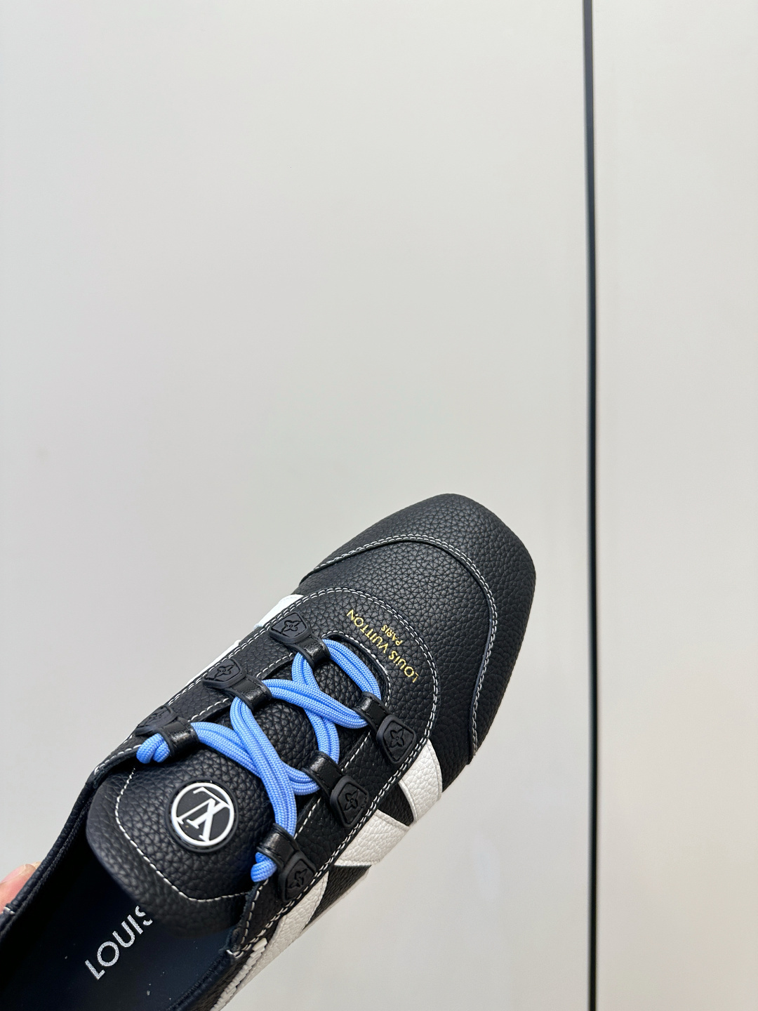 Louis Vuitton Men's Black Textured Leather Sneakers with Blue Laces