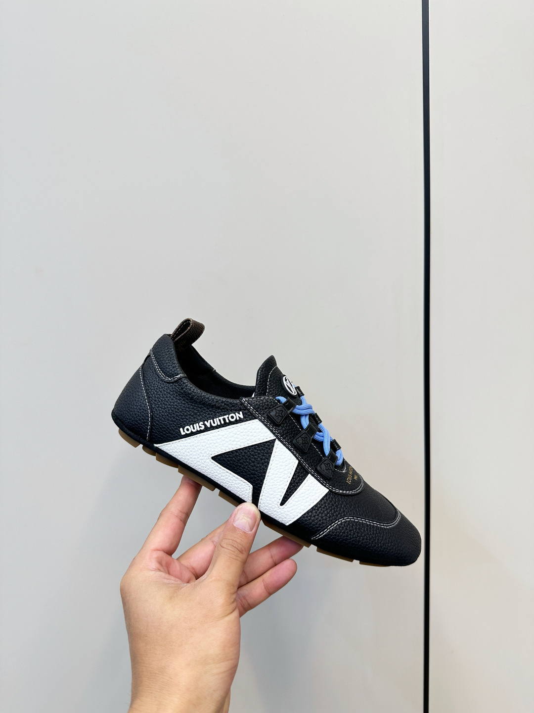 Louis Vuitton Men's Black Textured Leather Sneakers with Blue Laces