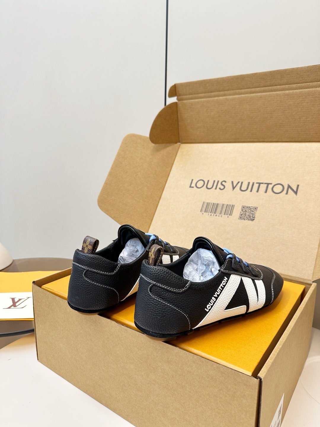 Louis Vuitton Men's Black Textured Leather Sneakers with Blue Laces