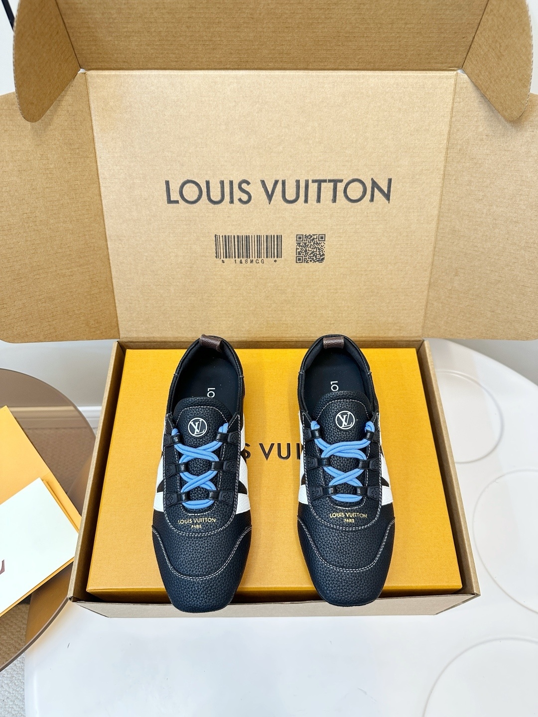 Louis Vuitton Men’s Black Textured Leather Sneakers with Blue Laces