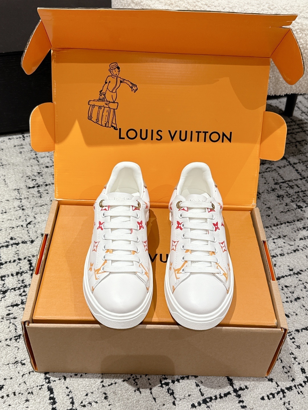 Louis Vuitton Women’s White Leather Monogram Sneakers