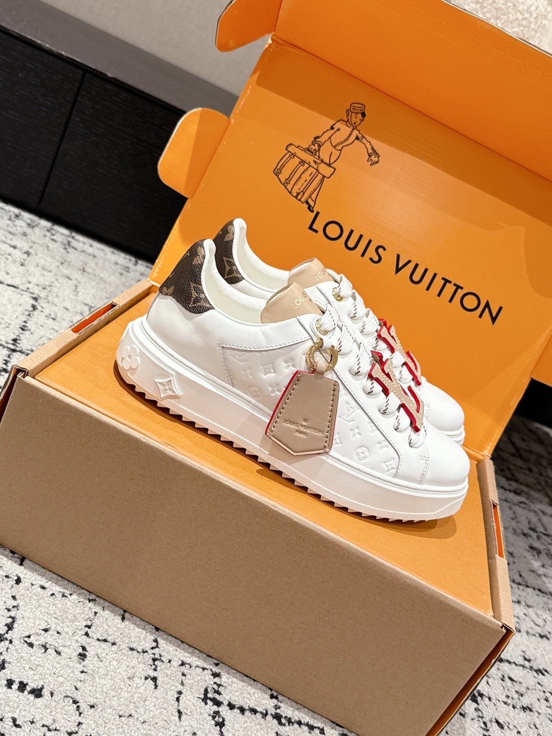 Louis Vuitton White Monogram Embossed Sneakers with Large LV Logo