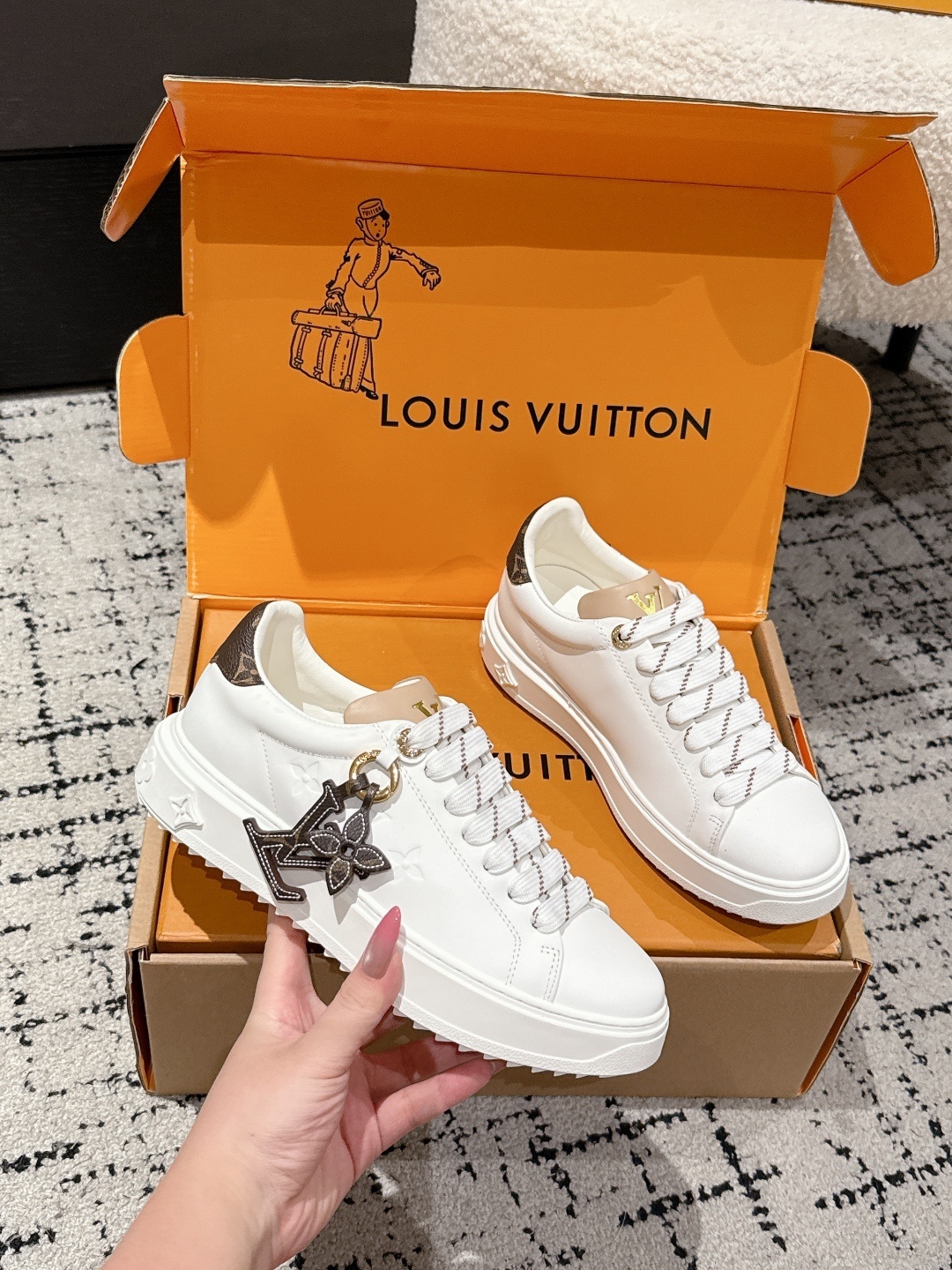 Louis Vuitton Women's White Leather Sneakers with Monogram Detail