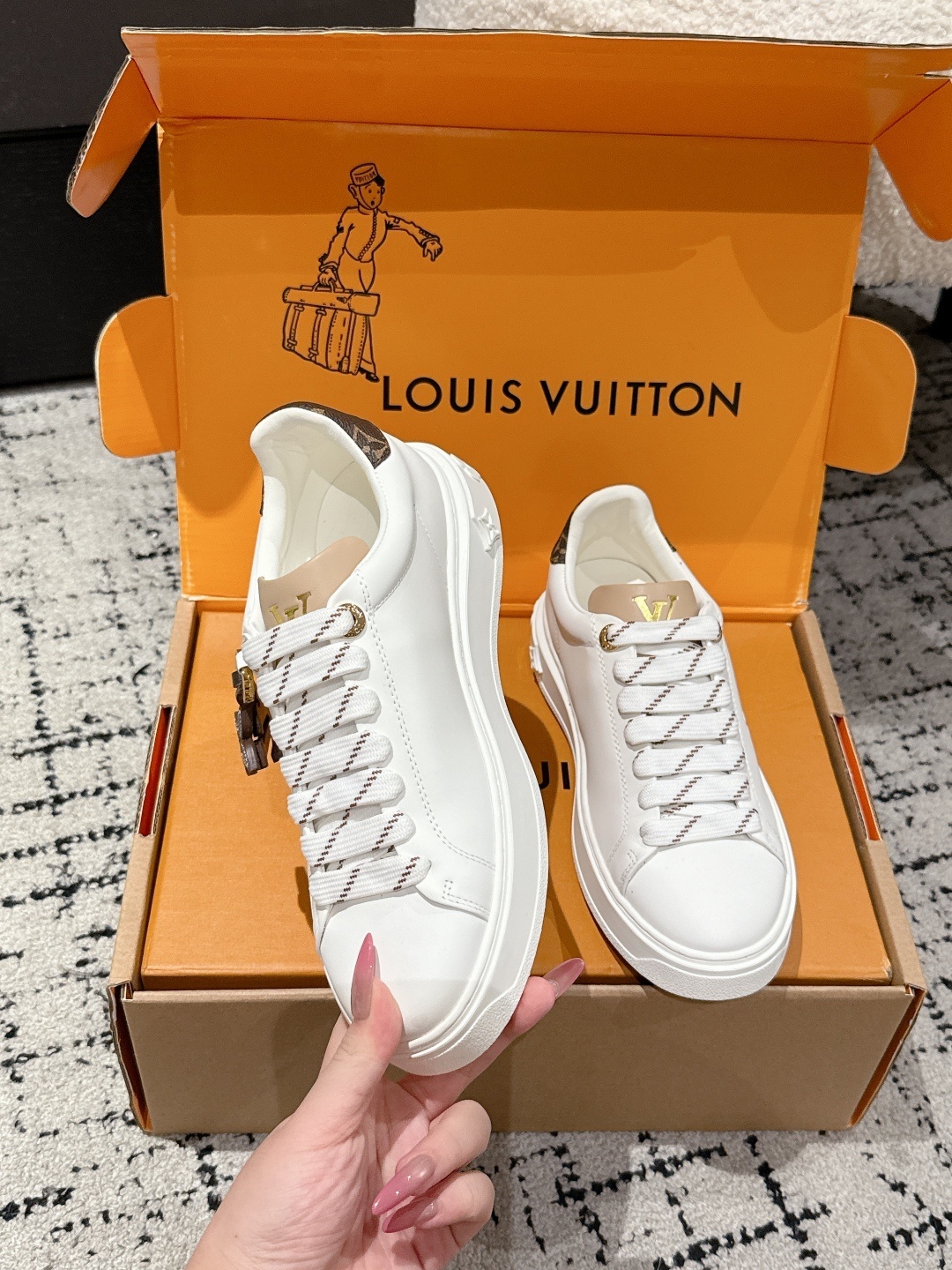 Louis Vuitton Women's White Leather Sneakers with Monogram Detail