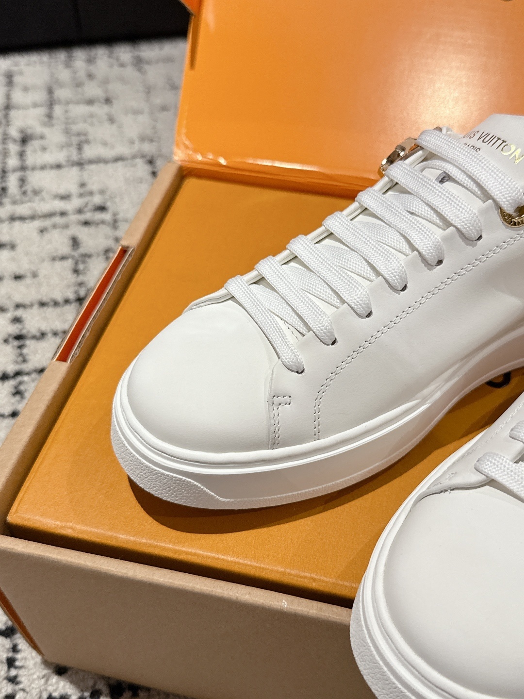 Louis Vuitton Women's White Leather Sneakers with Pink Accents
