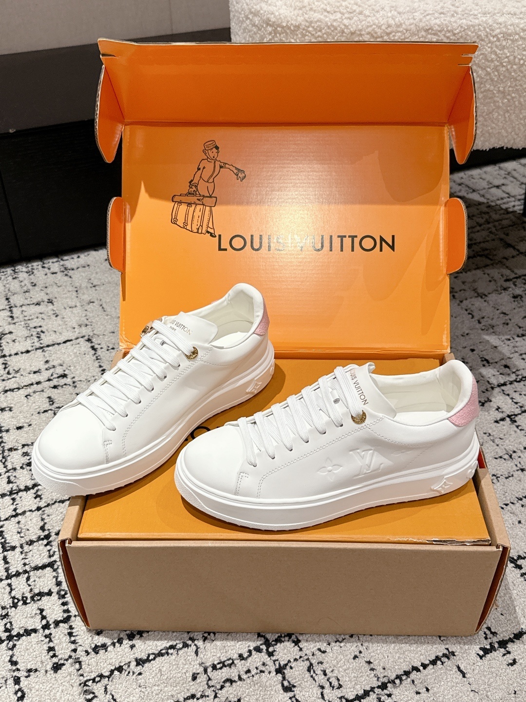 Louis Vuitton Women's White Leather Sneakers with Pink Accents