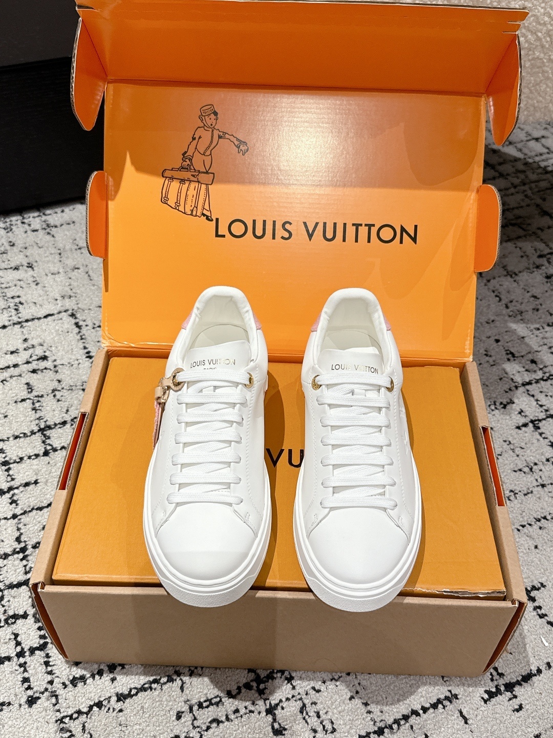 Louis Vuitton Women’s White Leather Sneakers with Pink Accents