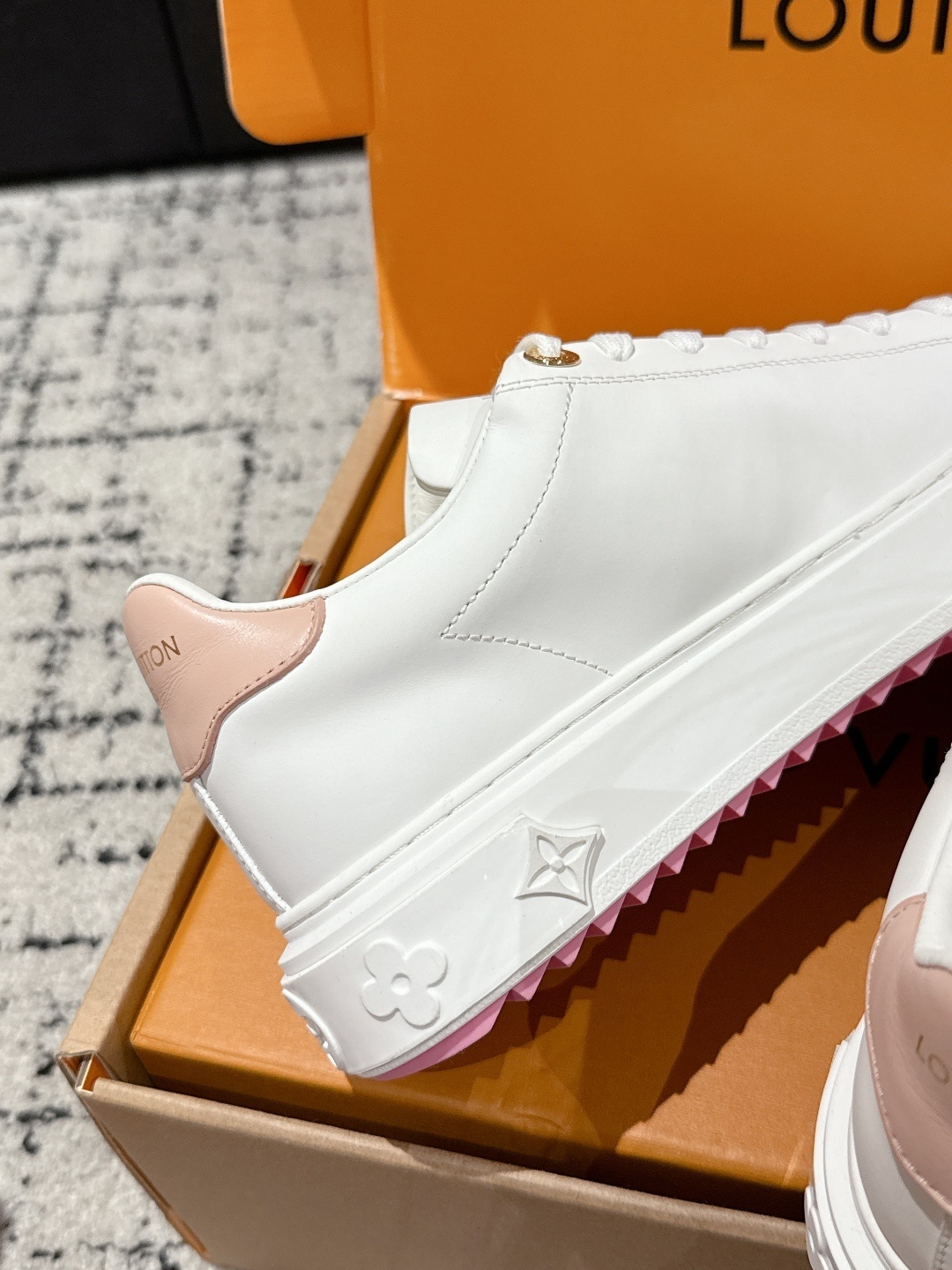 Louis Vuitton Women's White Leather Sneakers with Pink Floral Charm