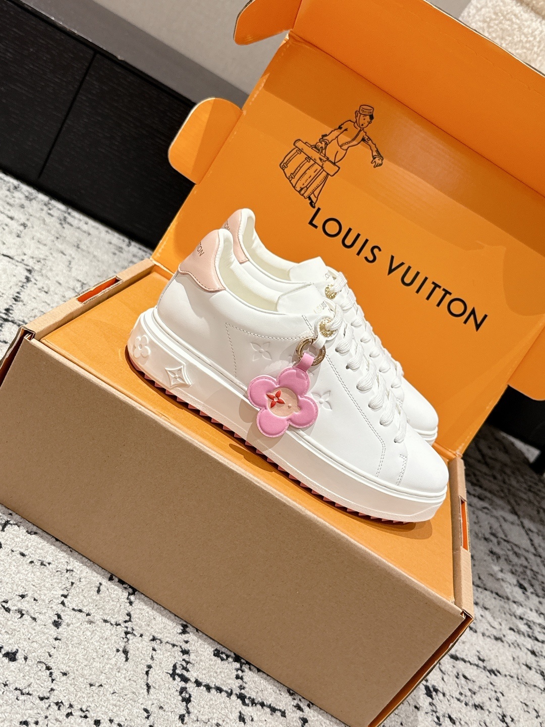 Louis Vuitton Women's White Leather Sneakers with Pink Floral Charm