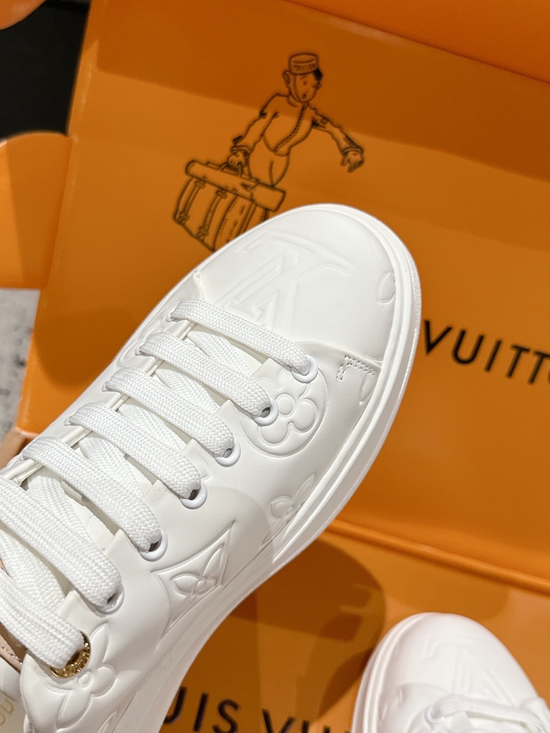 Louis Vuitton White Monogram Embossed Leather Sneakers for Women