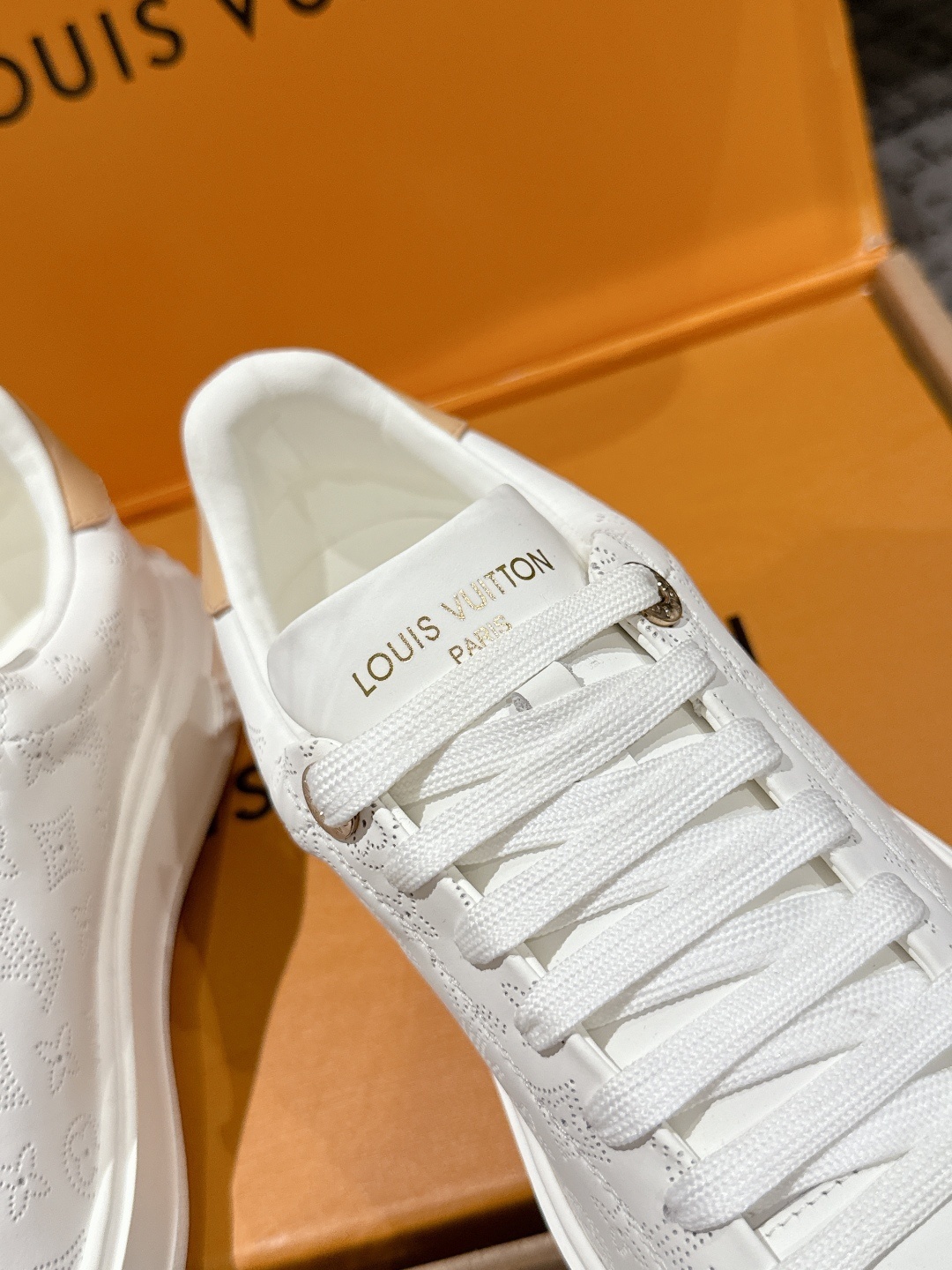 Louis Vuitton White Monogram Embossed Leather Low-Top Sneakers