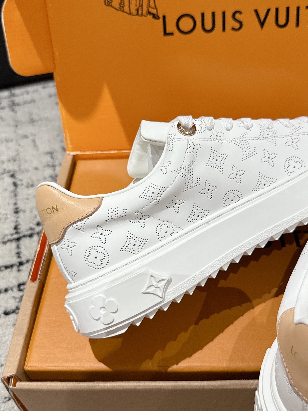 Louis Vuitton White Monogram Embossed Leather Low-Top Sneakers