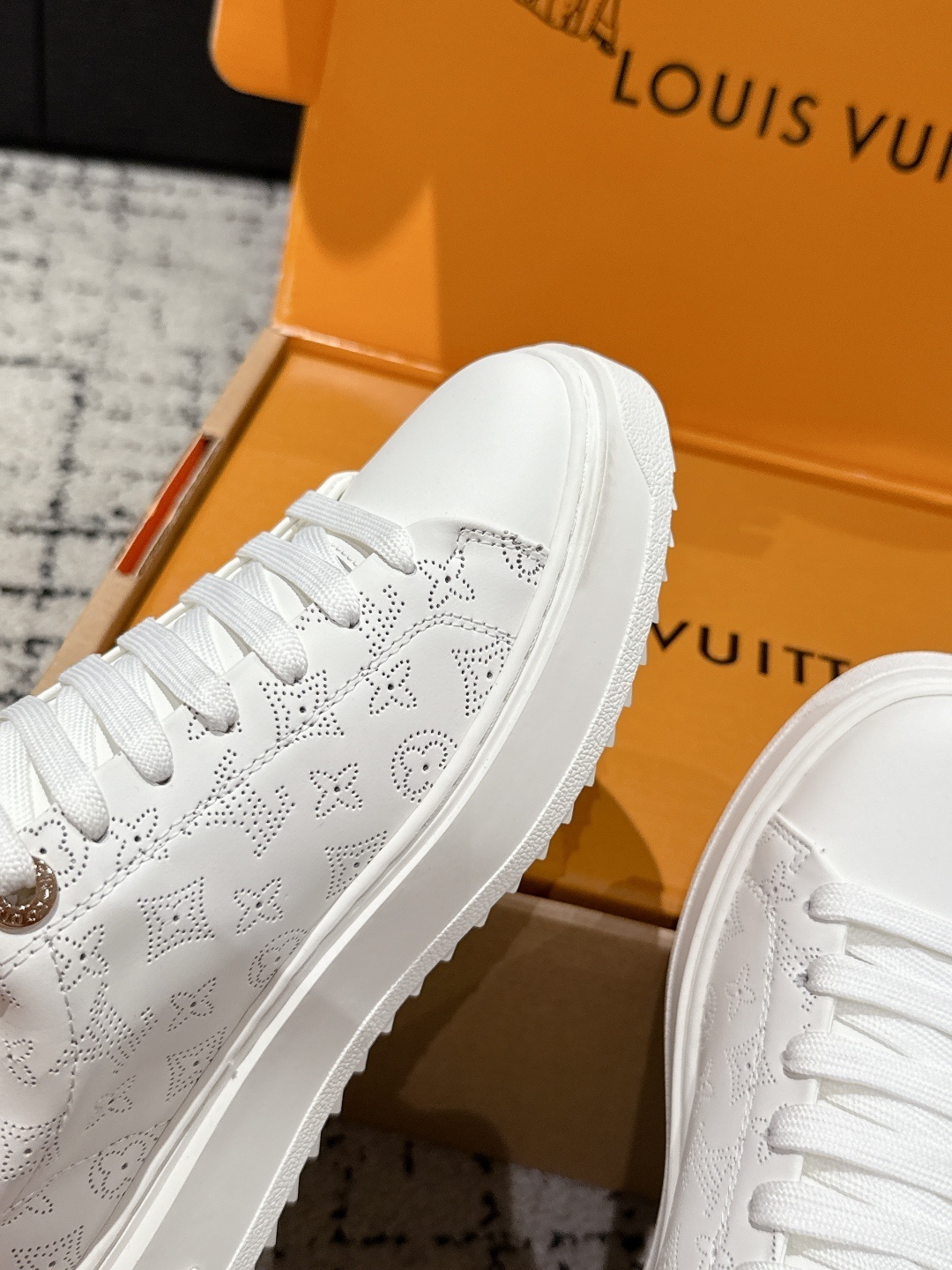 Louis Vuitton White Monogram Embossed Leather Low-Top Sneakers